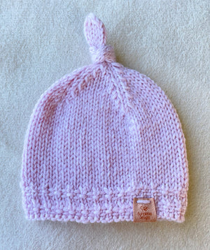 Hand Knitted Top Knot Hat and Matching Booties, Pastel Pink, Sizes 0-12 months