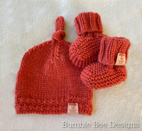 Hand Knitted Top Knot Hat and Matching Booties, Burnt orange